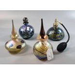 Three modern art glass Okra and other Art Nouveau and iridescent design perfume bottles with