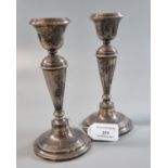 Pair of silver baluster candlesticks, Chester hallmarks. 15cm high approx. (B.P. 21% + VAT)