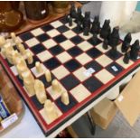 Modern black and white pottery chess set with board. (B.P. 21% + VAT)