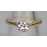 18ct gold diamond solitaire ring. Size R. 2.5g approx. (B.P. 21% + VAT)