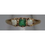 18ct gold opal and green stone ring. Ring size Q. (B.P. 21% + VAT)