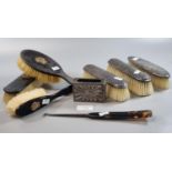 Box containing seven piece faux tortoiseshell dressing table set of brushes and button hook with