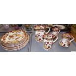 Two trays of Mason's 'Brown Velvet' ironstone plates and jugs: five dinner plates and five side