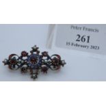 White metal gemset Rococo style enamel brooch. (B.P. 21% + VAT)