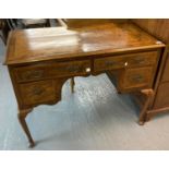 18th century style walnut kneehole desk, the moulded top above an arrangement of four drawers