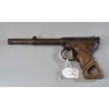 Diana model two air pistol with lightened pierced wooden grip. (B.P. 21% + VAT)
