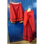 Two traditional woollen antique late 19th Century Welsh costume skirts, both red with stripes but