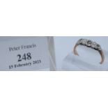 9ct gold three stone Art Deco style illusion set engagement ring. Size 11 + 1/2? (B.P. 21% + VAT)