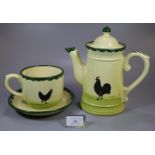 Part English pottery set to include: breakfast cup and saucer and teapot, hand painted with