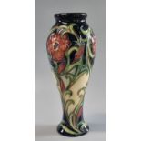 Modern Moorcroft art pottery tube lined 'Ragged Poppy' vase, in original box. Signed to the base and