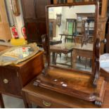 Large Victorian mahogany swivel bedroom mirror together with a modern ornately framed and gilded