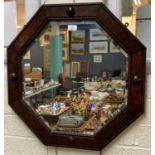 Early 20th century oak octagonal bevel plate mirror with beaded framed and moulded roundels. (B.P.