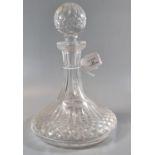 Waterford crystal thumb and hob nail cut ship's decanter with stopper and star cut base. (B.P. 21% +