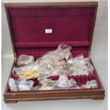 Walnut canteen cutlery box, the interior revealing a large collection of assorted GB and other