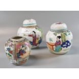 Two similar Chinese porcelain polychrome ginger jars, decorated with figures in a garden. Together