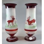 Pair of cranberry glass and frosted baluster vases, standing on circular bases, decorated with