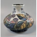 Modern Moorcroft art pottery tube lined Bramble pattern squat vase. 11cm high approx. With