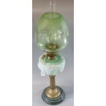 Early 20th Century double oil burner lamp having green and clear etched glass shade above a green