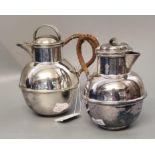 Two similar silver plated Jersey baluster jugs with wicker handles. (2) (B.P. 21% + VAT)