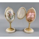 Pair of modern decorative egg ornaments on stands with rose bouquets. (B.P. 21% + VAT)