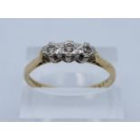 18ct gold three stone illusion set diamond engagement ring. 3.4g approx, size U. (B.P. 21% + VAT)