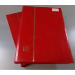 Two large good quality red empty stockbooks. (B.P. 21% + VAT)