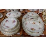 Two trays of Royal Doulton part dinnerware, florally decorated with garden flowers and pale green