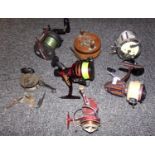 Box of vintage fishing reels: Captain Mitchell 624 (made in France), Daiwa sealine SL250H graphite