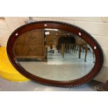 Edwardian mahogany framed bevel plate oval mirror with gadrooned edge. (B.P. 21% + VAT)