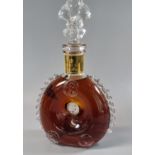 Remy Martin Louis XIII Grande Champagne Cognac in Baccarat decanter with fleur-de-lis glass stopper.