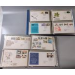 Great Britain collection of stamp First Day Covers in two blue albums: 1971 to 1983 period. (B.P.