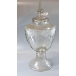 Late Victorian glass lidded drinks dispenser. 60cm high approx. (B.P. 21% + VAT) No tap and some