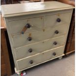 Late Victorian painted pine chest of two short and three long drawers with turned handles on