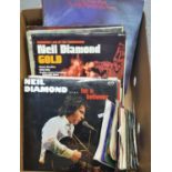 Box of vinyl LPs and RPM 45s to include: Neil Diamond, Leonard Cohen, Elaine Paige 'West Side