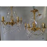 Pair of modern brass finish five section lustre candelabrum ceiling light fittings with glass