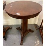 19th century mahogany lamp table, the circular moulded top above a shaped pedestal on tri-form