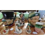 Collection of ceramic ornaments: four West German Goebel figures of boys, small Beswick 'Micawber'