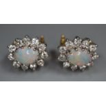 18ct gold opal and diamond clip earrings. 4.9g approx. (B.P. 21% + VAT)