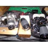 Box of photographic equipment: Pentax P30 SLR camera with 80-200mmm zoom lens and standard 50mm
