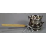 Unusual silver tea strainer with drip pan below and composition handle. London hallmarks. 2.2 troy