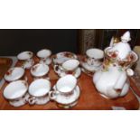 Tray of Royal Albert 'Old Country Roses' coffee ware: six coffee cups and saucers, a coffee pot, two