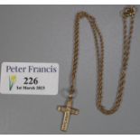 9ct gold engraved cross on chain. 3.9g approx. (B.P. 21% + VAT)