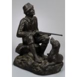 Heredities bronzed study of a hunter with shotgun and hound, inscribed signature R. Chadwick. (B.