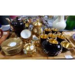 Tray of lustre coffee ware to include: Wade England black glazed part coffee set; coffee cups and