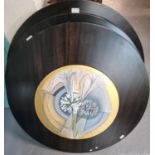 Ernitie Jong, three hand painted circular hardwood table tops/hanging panels with stylised floral