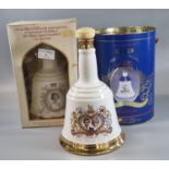 A group of Bell's Old Scotch Whisky pottery commemorative whisky decanters. All appearing to be