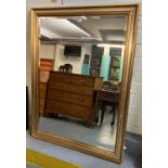 Large modern bevel plate mirror, the frame decorated with gilt and silver finish. 105x136cm