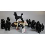 Collection of modern Beswick china and other composition Poodle dogs. Four black Beswick and five