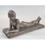 After Neil Godfry (born 1938), bronzed study of a young boy, signed and dated 1987. 27cm long