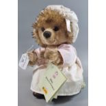 Steiff 'Mrs Tiggy-Winkle' soft toy with original clothing and button ear. Labelled. (B.P. 21% + VAT)